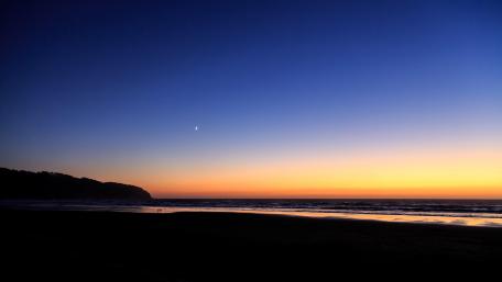 Twilight Serenity Over The Beach wallpaper
