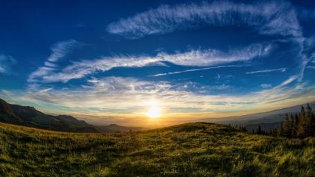 Majestic Sunset Over Rolling Hills wallpaper