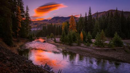 Serene Mountain River at Sunset Glow wallpaper