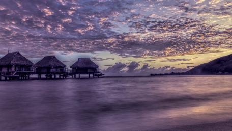 Serene Dusk Over Water Bungalows Nature Wallpaper wallpaper