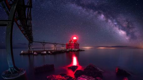 Lighthouse Under the Milky Way Glow wallpaper