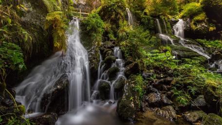 Serene Cascading Waterfalls in Nature wallpaper