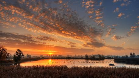 Serene Sunset Over Tranquil Lake Scene wallpaper