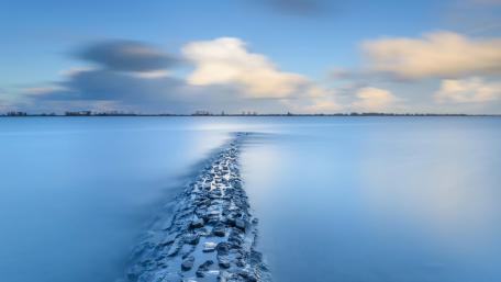 Serene Blue Hour Over Tranquil Lake Waters wallpaper