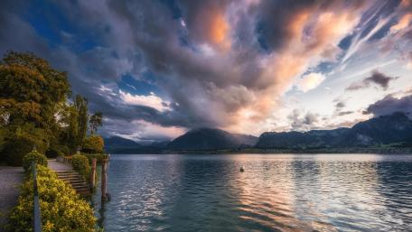Serene Lake Under a Dramatic Sky wallpaper