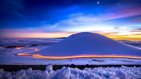 Serene Winter Road Under Dusk Sky wallpaper