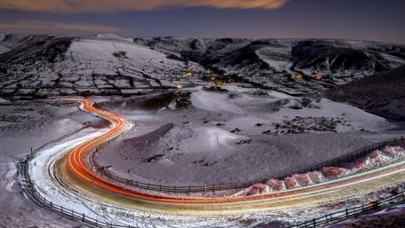Winding Road Through Winter Wonderland wallpaper