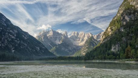 Majestic Mountain Valley with Tranquil Lake wallpaper