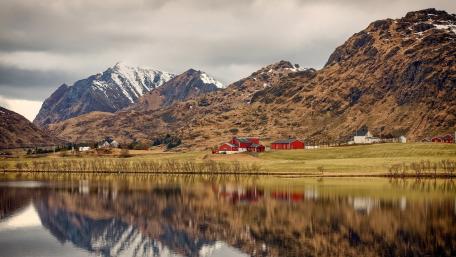 Serene Mountain Village Reflection in Nature wallpaper