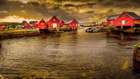 Charming Village with Red Houses by the Water wallpaper