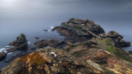 Misty Peninsula Ruins by the Sea wallpaper