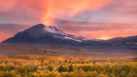 Autumn Peaks Under a Pink Sky wallpaper