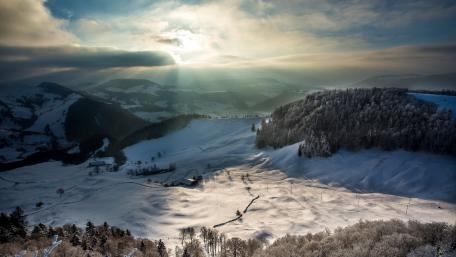 Winter Serenity in Snowy Mountains wallpaper
