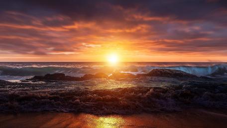 Sunset Serenity Over Ocean Waves wallpaper