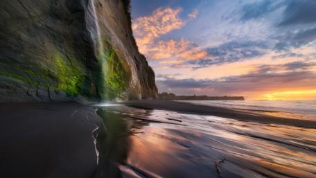 Majestic Waterfall by the Sea wallpaper