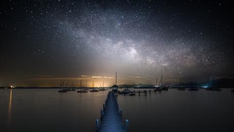 Starry Night over Tranquil Lake wallpaper
