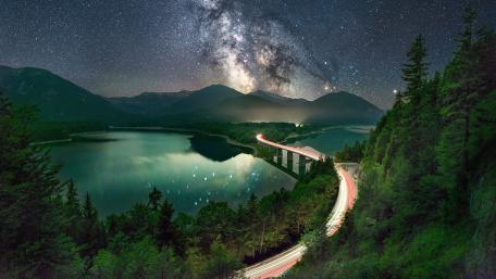Milky Way Over Serene Lake Bridge wallpaper