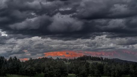 Dramatic Clouds Over Nature's Canvas wallpaper