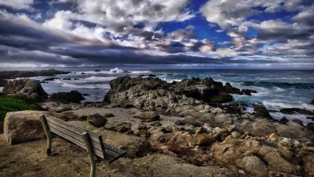 Serene Coastal Bench with Ocean View wallpaper