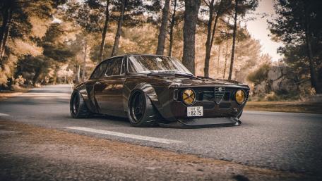Vintage Alfa Romeo Elegance on Asphalt wallpaper