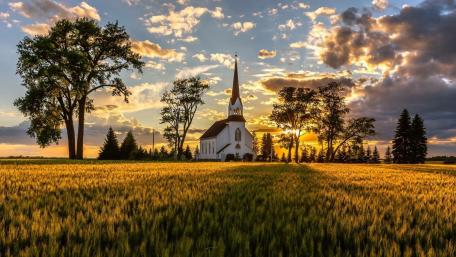 Golden Sunrise Over Countryside Church wallpaper
