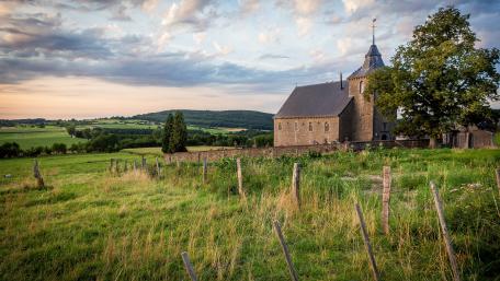 Serene Village Temple in Lush Countryside View wallpaper