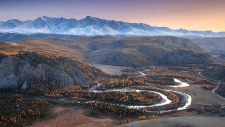 Majestic Landscape of Curvy River and Snowy Mountains wallpaper
