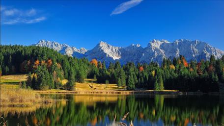 Majestic Mountains and Serene Lake Scene wallpaper