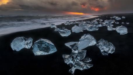 Ice Gems on the Black Sand Shoreline wallpaper