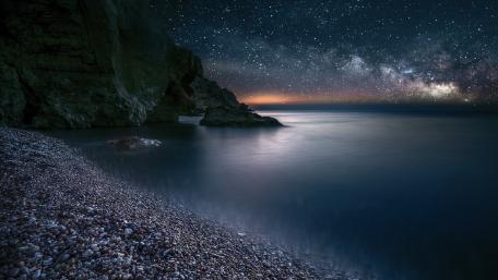 Milky Way Over Tranquil Shoreline wallpaper