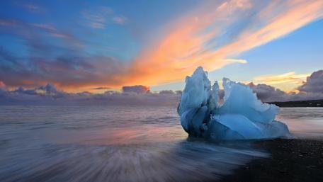 Majestic Ice Against a Vibrant Sky wallpaper