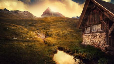 Serene Cottage in Majestic Mountains wallpaper