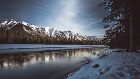 Serene Winter Mountain Landscape Reflection in River wallpaper
