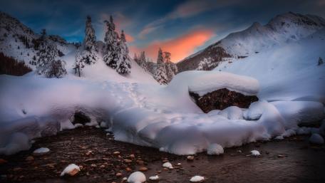 Serene Winter Landscape in Majestic Mountains wallpaper