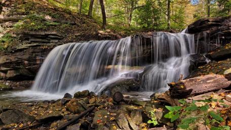 Serenity of Nature's Waterfall wallpaper