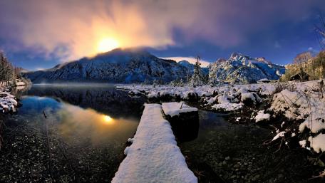 Serene Winter Reflections on a Snowy Pier wallpaper