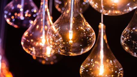 Illuminated Elegance in Glass Fixtures wallpaper