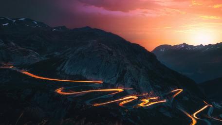Mountain Pass Radiance in Sunset Glow wallpaper