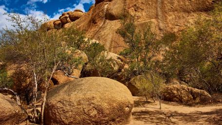 Serene Boulders Under a Blue Sky wallpaper