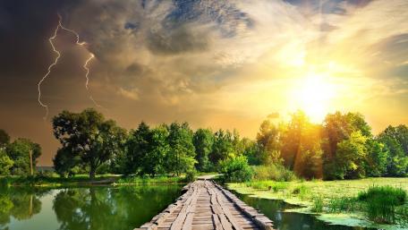 Majestic Thunderstorm Over Tranquil Waters wallpaper