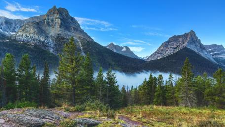 Majestic Mountain Range in a Serene Landscape wallpaper