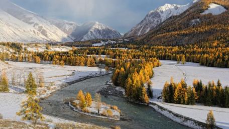 Serene Winter River Landscape in a Valley wallpaper