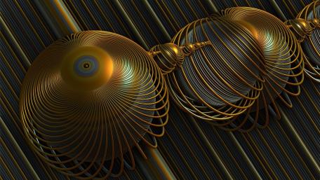 Golden Metallic Spheres in Motion wallpaper