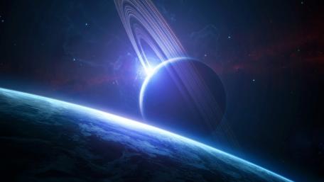 Ringed Planet Over Horizon wallpaper