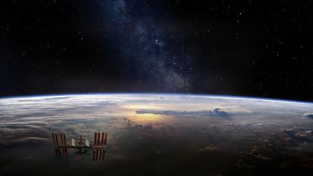 Cosmic View of Earth and the ISS wallpaper