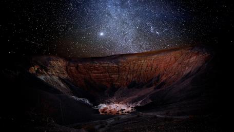 Majestic Milky Way Above Dark Valley wallpaper