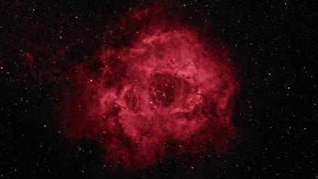 Cosmic Beauty of the Rosette Nebula in Red Shades wallpaper