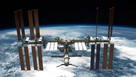 Majestic View of the International Space Station in Orbit wallpaper