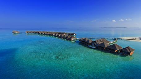 Tropical Serenity Over Water Bungalows wallpaper