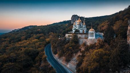 Serene Temple Amidst Nature's Splendor wallpaper